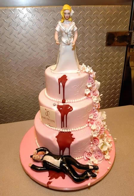 Pink Fondant Divorce Cake Bride Pushes Groom Off Cake riotdaily.com
